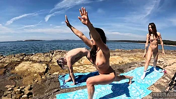 Two beautiful girls playing sports on the beach with a guy, featuring Gabriella Lati.
