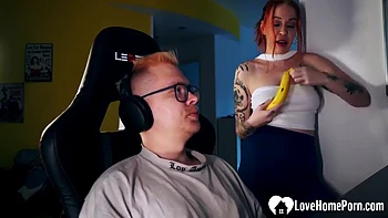 Redhead Girlfriend Distracts Gamer with Deep Blowjob POV