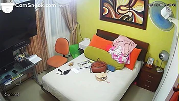 Latina brunette undresses after shower caught on cam